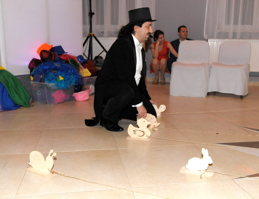 Animal race game at a wedding reception